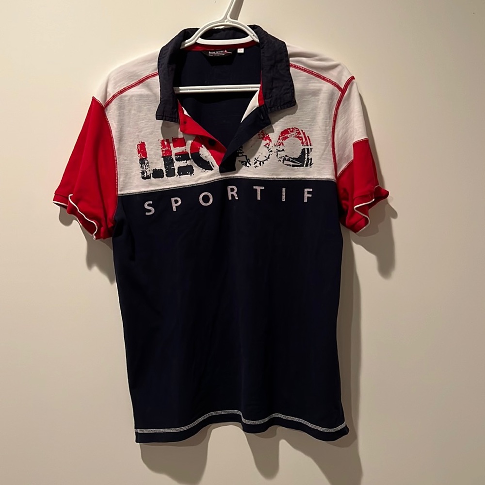 Navy and red Le Coq Sportif golf shirt